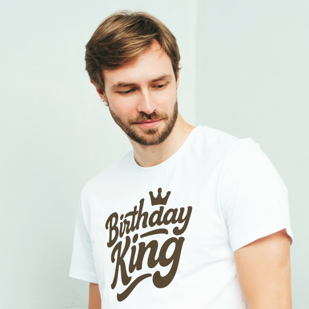 Man wearing a black “Birthday King” t-shirt with a gold crown graphic, standing in a stylish room with a plant and framed pictures on a shelf. Perfect gift for dads, husbands, brothers, or sons on their special day.





Ask ChatGPT
